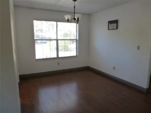 a view of a room that has a window in it