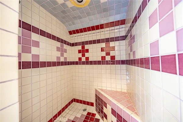 a bathroom with a sink and a shower