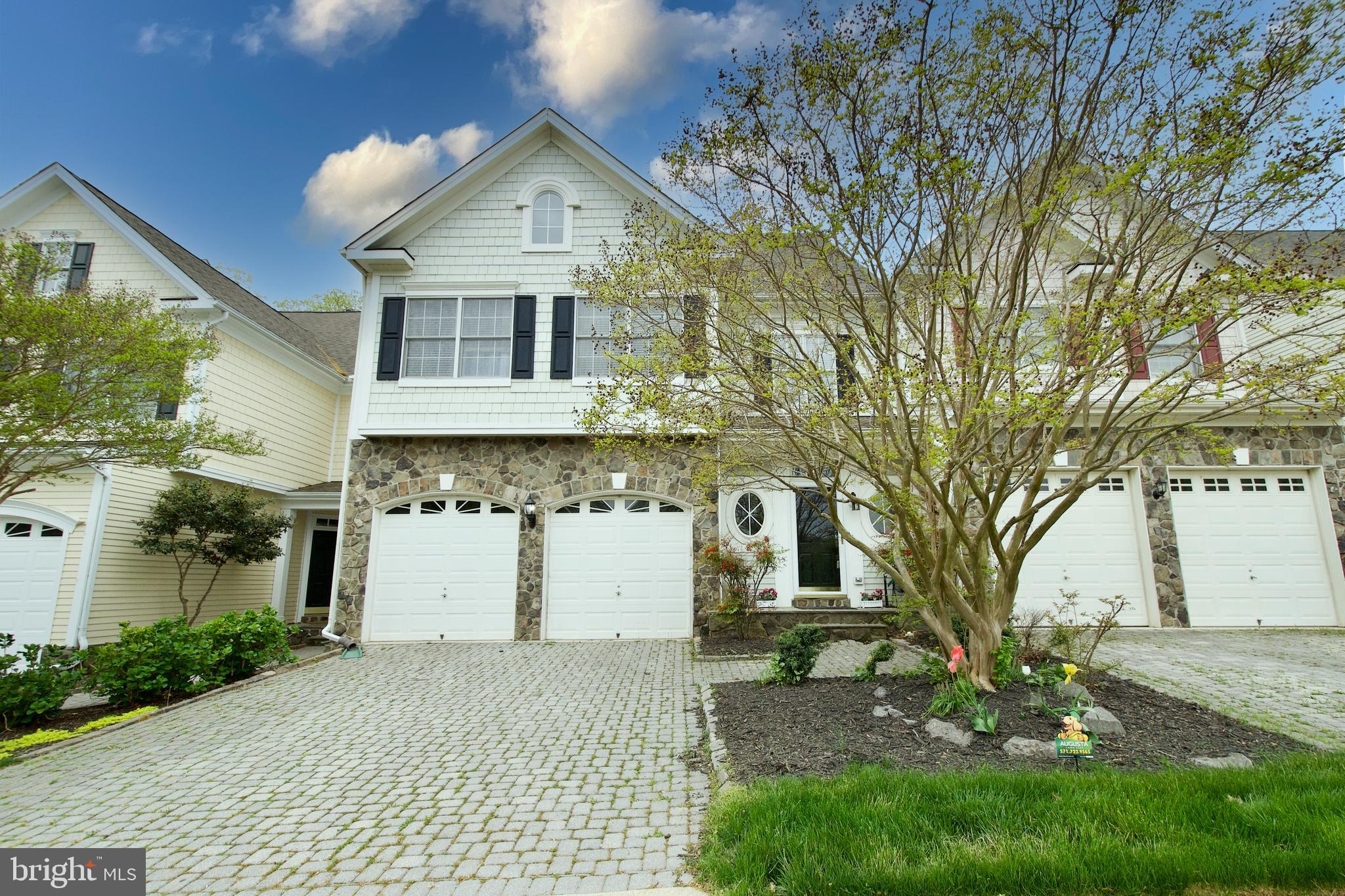 16830 Panorama Drive Woodbridge, VA 22191 - Photo 1 of 46 a front view of a house with a garden