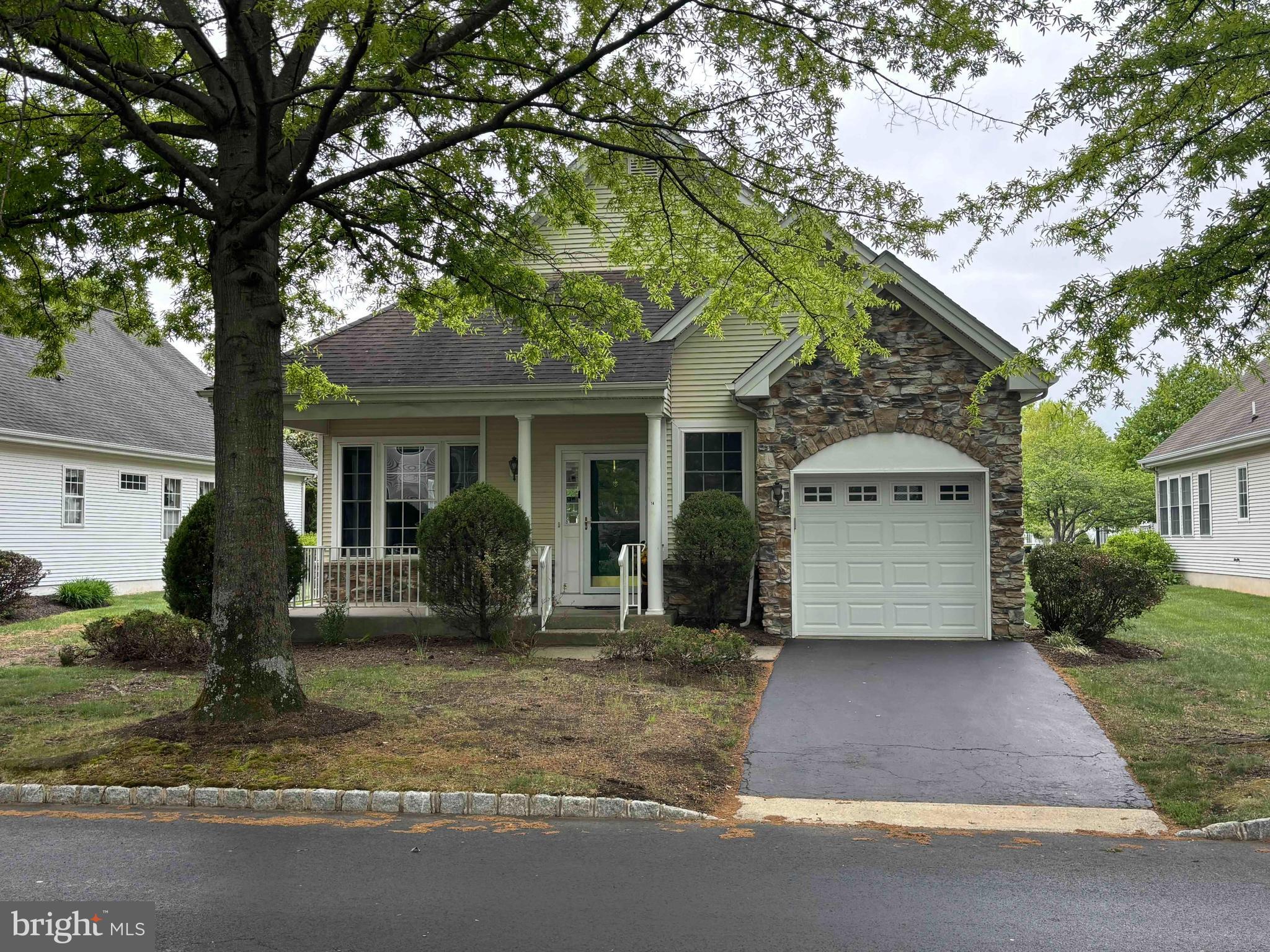 14 Hummingbird Drive Hamilton, NJ 08690 - Photo 1 of 22 a front view of a house with garden