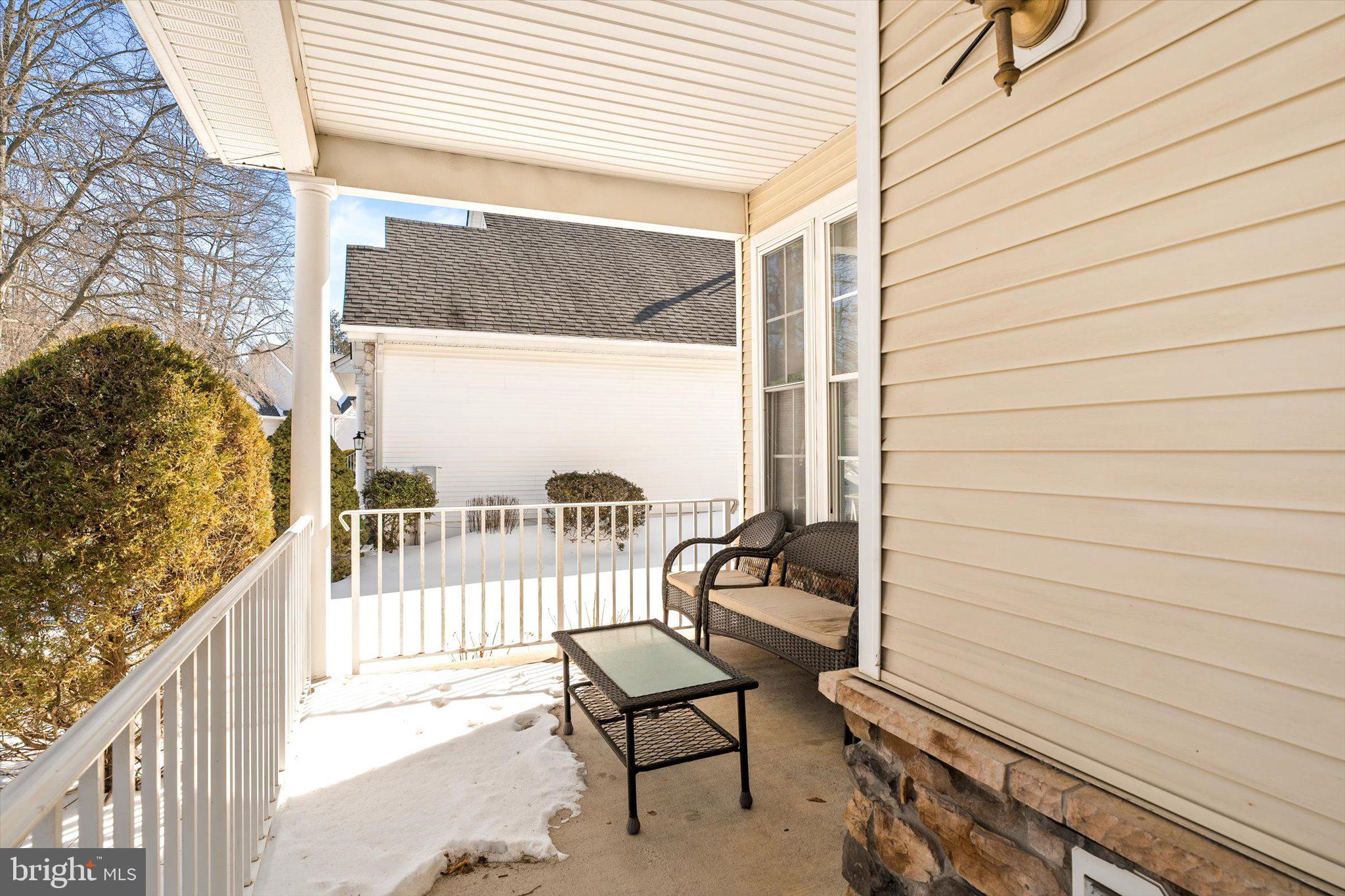 14 Hummingbird Drive Hamilton, NJ 08690 - Photo 2 of 24 a view of a bench in the balcony