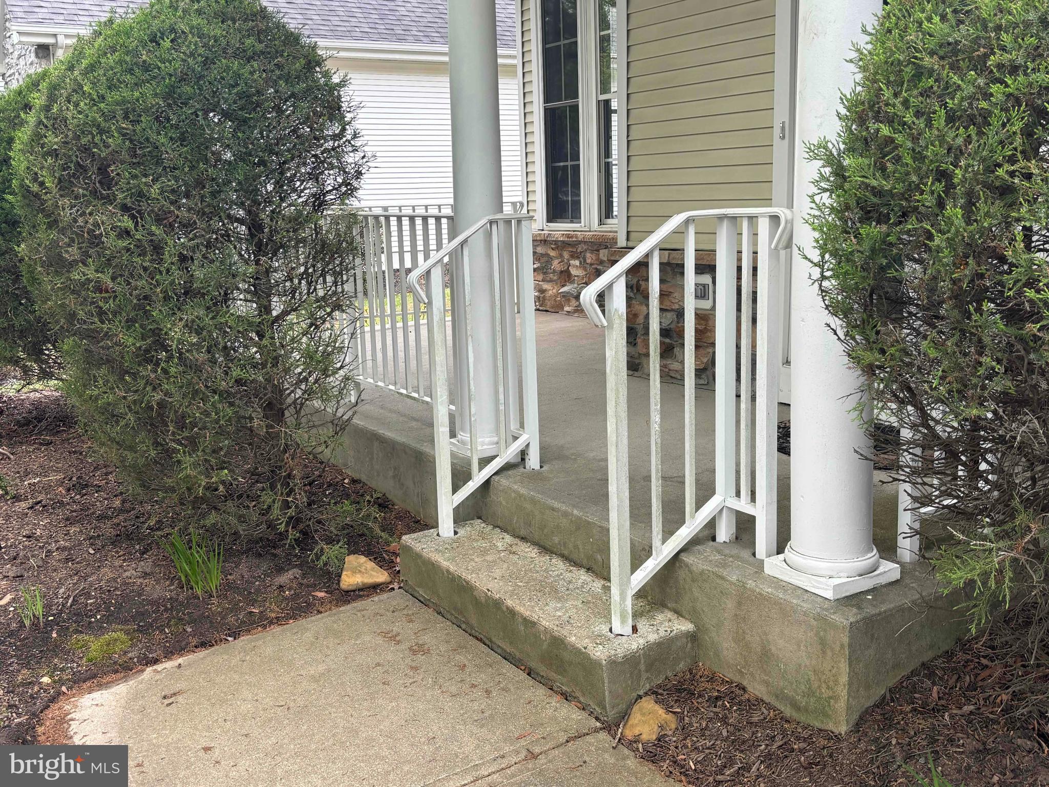 14 Hummingbird Drive Hamilton, NJ 08690 - Photo 2 of 22 a view of wooden house with a small yard and plants
