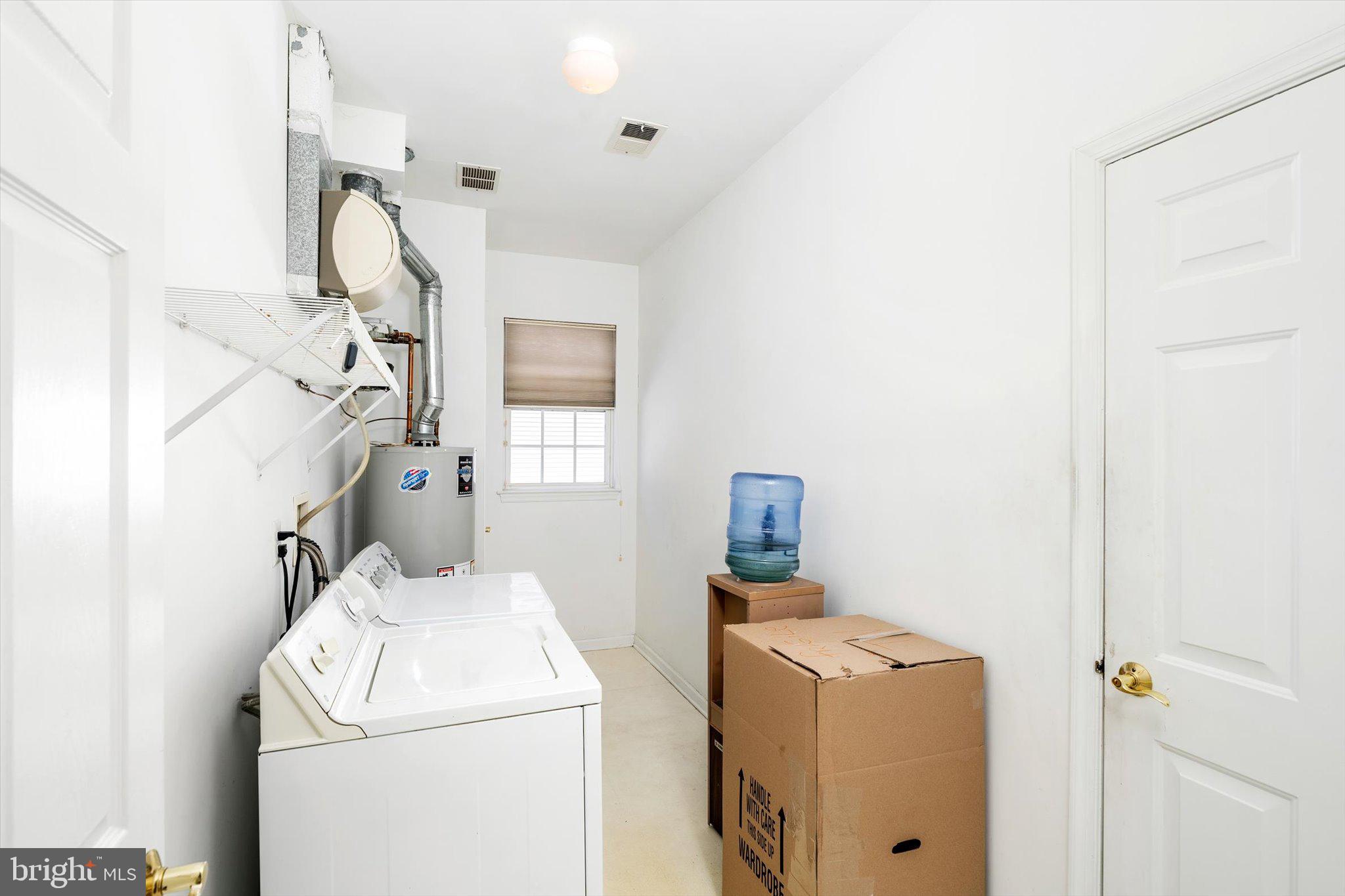 14 Hummingbird Drive Hamilton, NJ 08690 - Photo 21 of 24 a utility room with dryer and washer