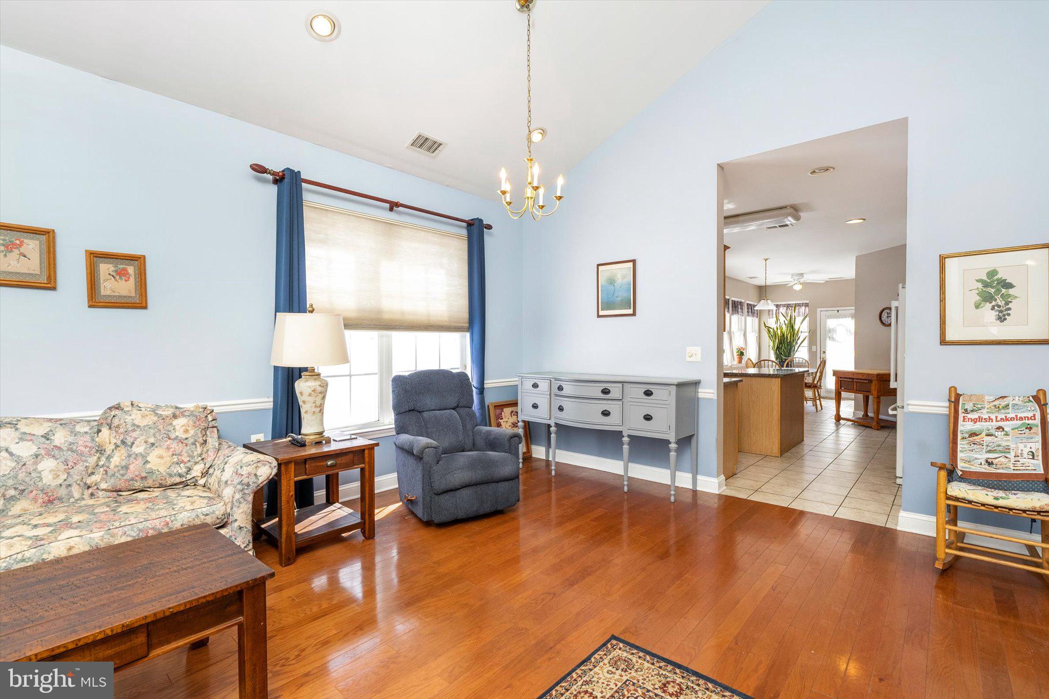 14 Hummingbird Drive Hamilton, NJ 08690 - Photo 5 of 24 a living room with furniture and a wooden floor
