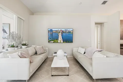 a living room with furniture and a couch