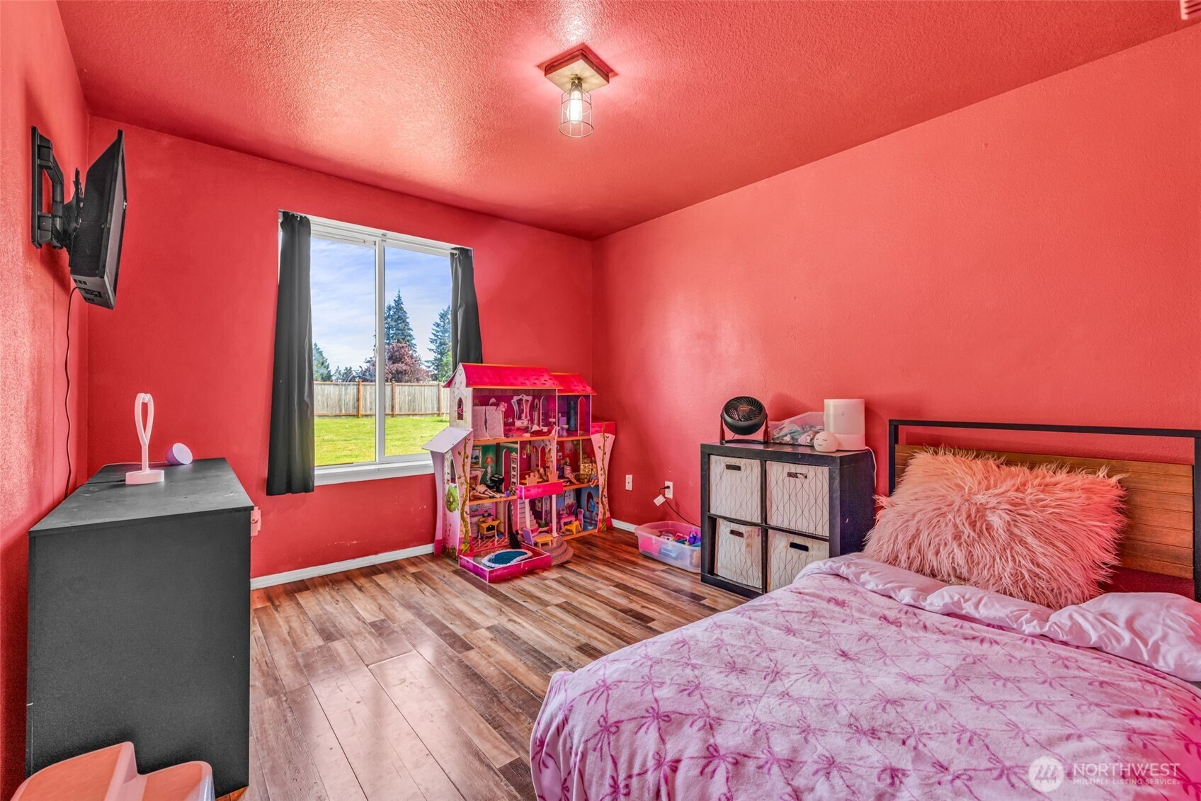 10313 School Land Road Southwest Rochester, WA 98579 - Photo 32 of 40 a bed room with two bed and a potted plant