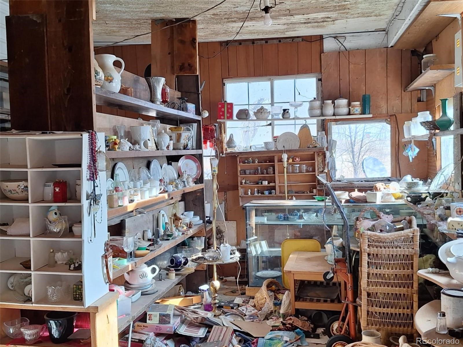 37025 Highway 24 Matheson, CO 80830 - Photo 13 of 13 a room with lots of different colored cloths
