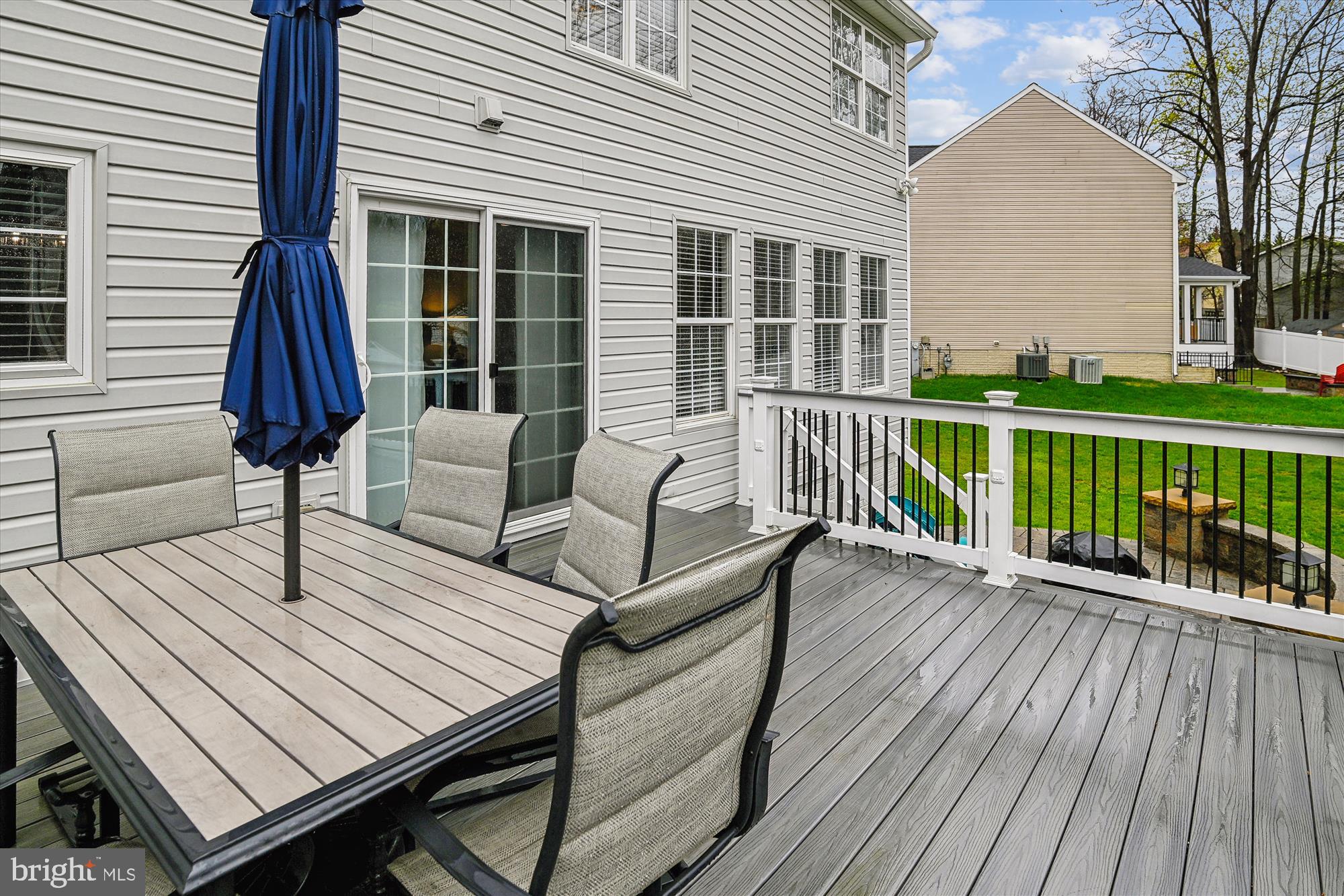 5958 Florey Road Hanover, MD 21076 - Photo 13 of 77 a view of a wooden deck with furniture