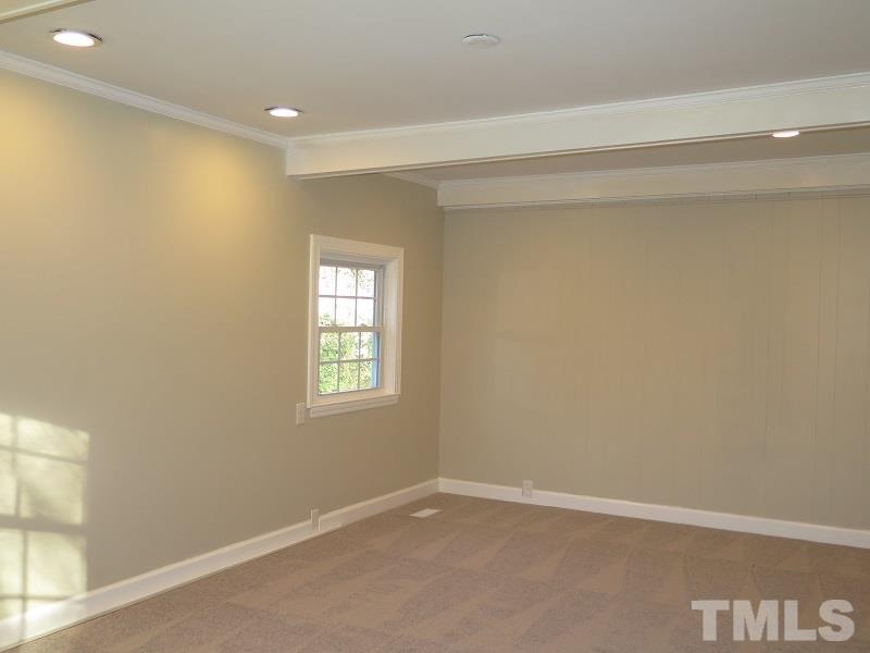 711 St George Road Raleigh, NC 27610 - Photo 16 of 19 a view of an empty room with a window