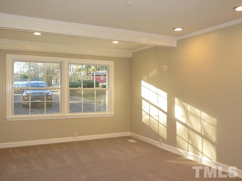 711 St George Road Raleigh, NC 27610 - Photo 17 of 19 a view of an empty room with a window