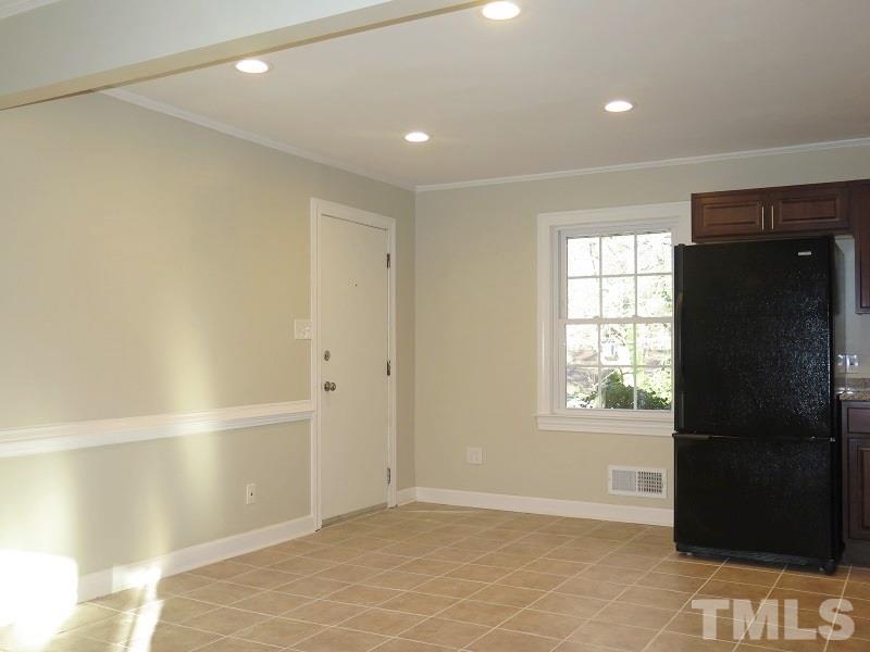 711 St George Road Raleigh, NC 27610 - Photo 5 of 19 a view of an empty room with a window