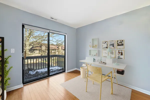 a workspace with furniture window and outside view