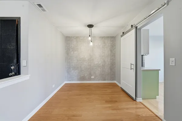 a view of a bathroom with a shower and a tub