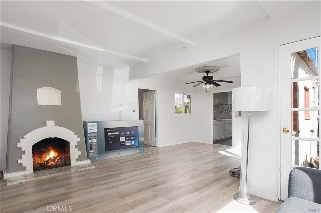 251 Avenida Del Mar, Unit A San Clemente, CA 92672 - Photo 5 of 15 a view of livingroom with furniture and fireplace