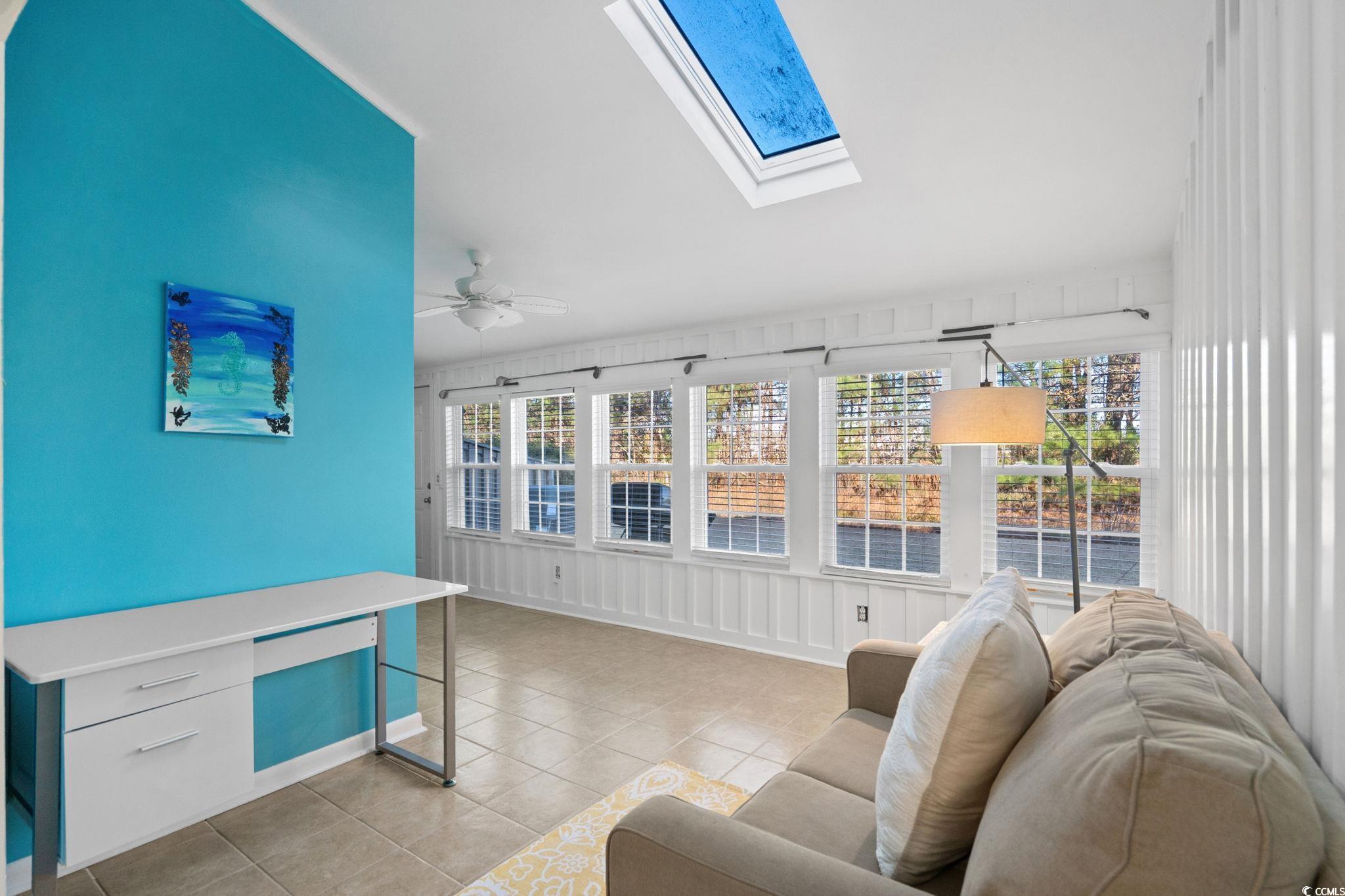 500 Eagle Way, Unit 6 Little River, SC 29566 - Photo 13 of 38 Sunroom with a skylight, tile patterned flooring, and plenty of natural light