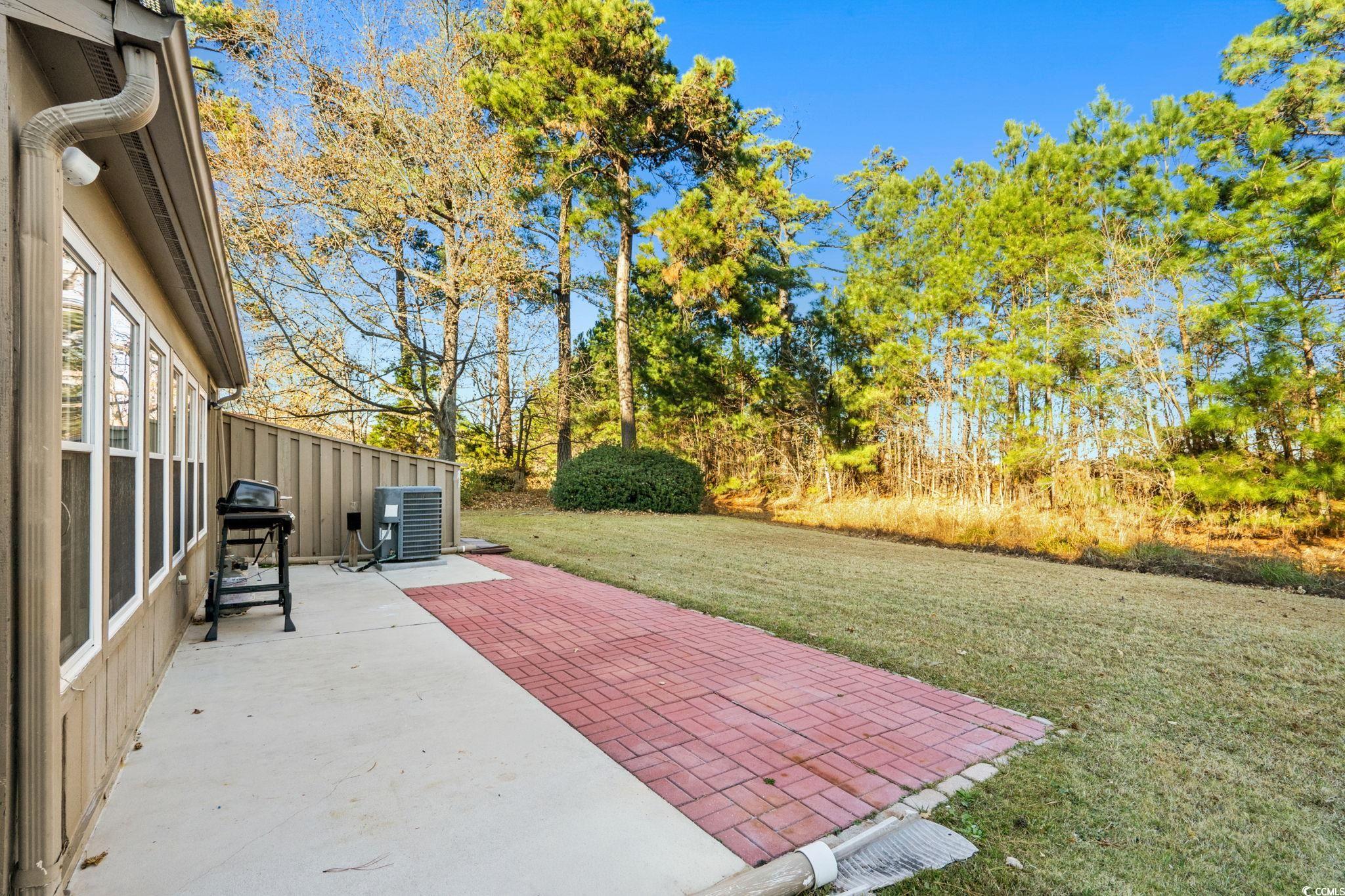 500 Eagle Way, Unit 6 Little River, SC 29566 - Photo 24 of 38 View of patio with area for grilling