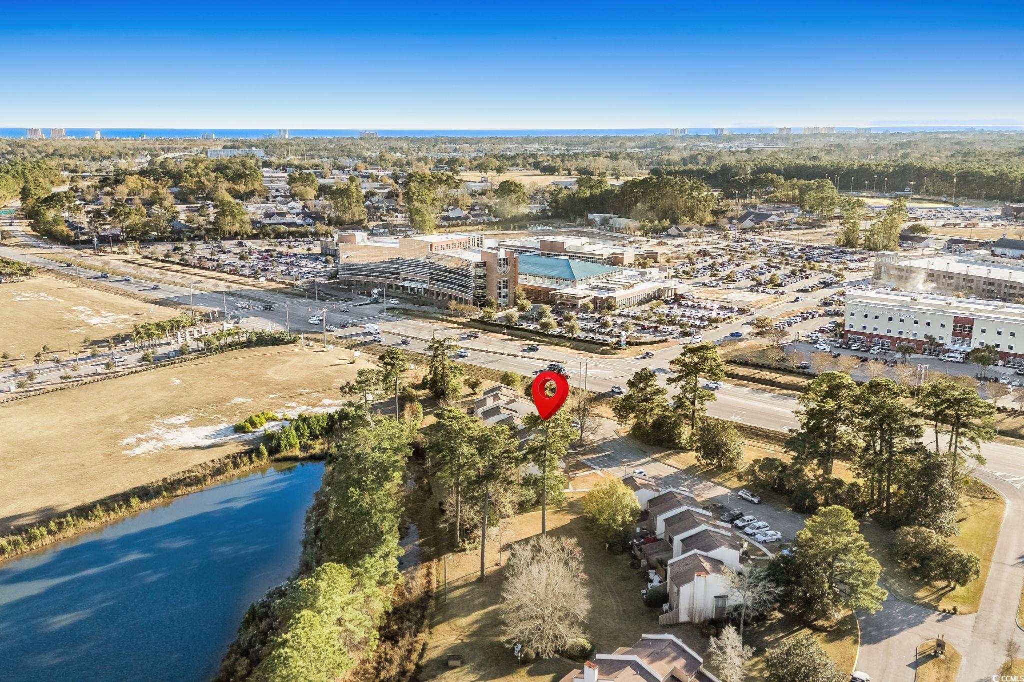 500 Eagle Way, Unit 6 Little River, SC 29566 - Photo 28 of 38 Bird's eye view of a large body of water