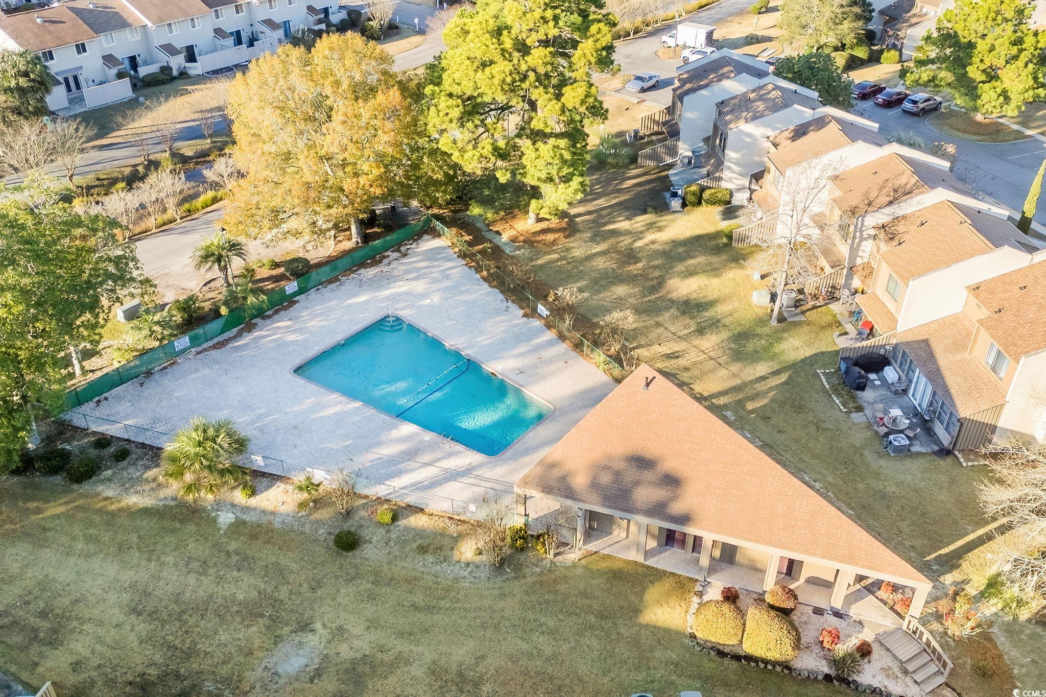 500 Eagle Way, Unit 6 Little River, SC 29566 - Photo 30 of 38 Aerial perspective of suburban area with a pool area