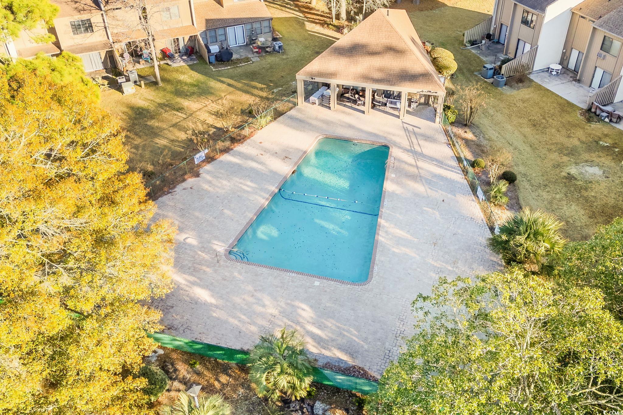 500 Eagle Way, Unit 6 Little River, SC 29566 - Photo 31 of 38 Aerial view of residential area featuring a pool area