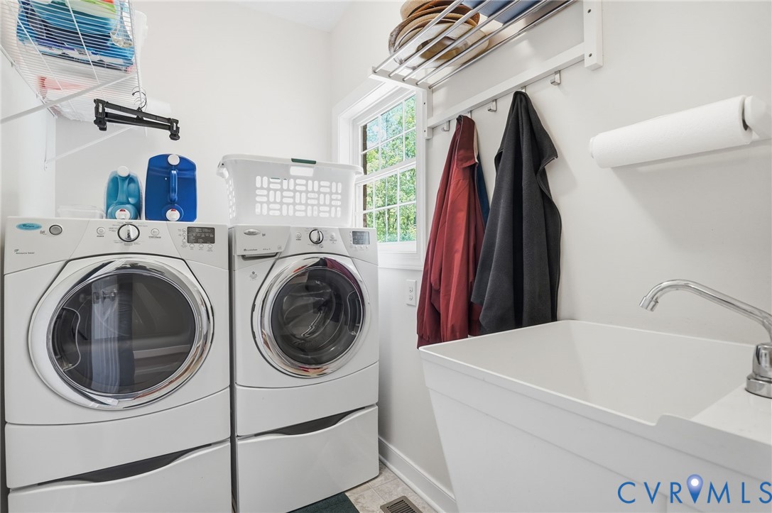 3600 Market Road Mechanicsville, VA 23111 - Photo 25 of 67 a view of a washer and dryer in a utility room