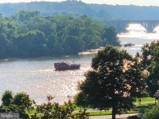 a view of a back yard of the house and green space