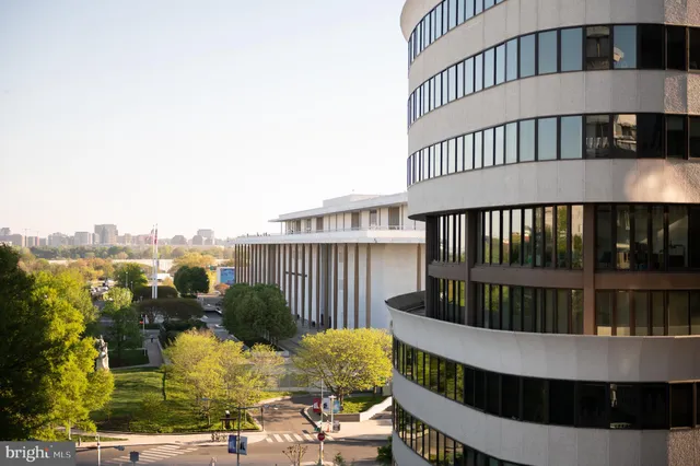 a view of a balcony with an ocean