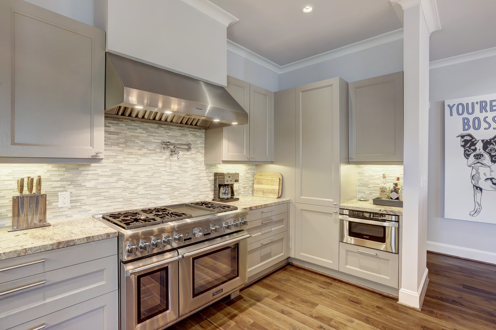 2221 Welch Street, Unit 201 Houston, TX 77019 - Photo 12 of 26 Another view of the kitchen and all of the storage it has to offer!