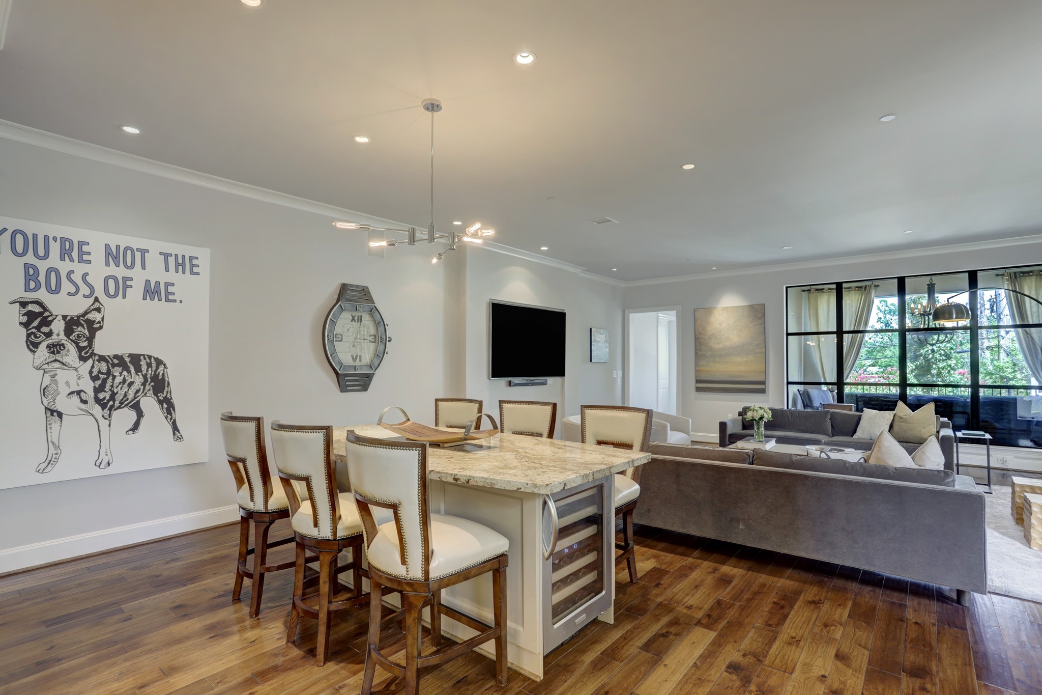 2221 Welch Street, Unit 201 Houston, TX 77019 - Photo 13 of 26 Another view from the kitchen into the living room that showcases the open concept living.