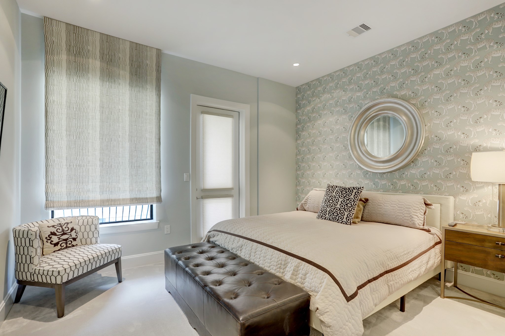 2221 Welch Street, Unit 201 Houston, TX 77019 - Photo 19 of 26 Secondary bedroom with an ensuite and access to one of the three balconies.