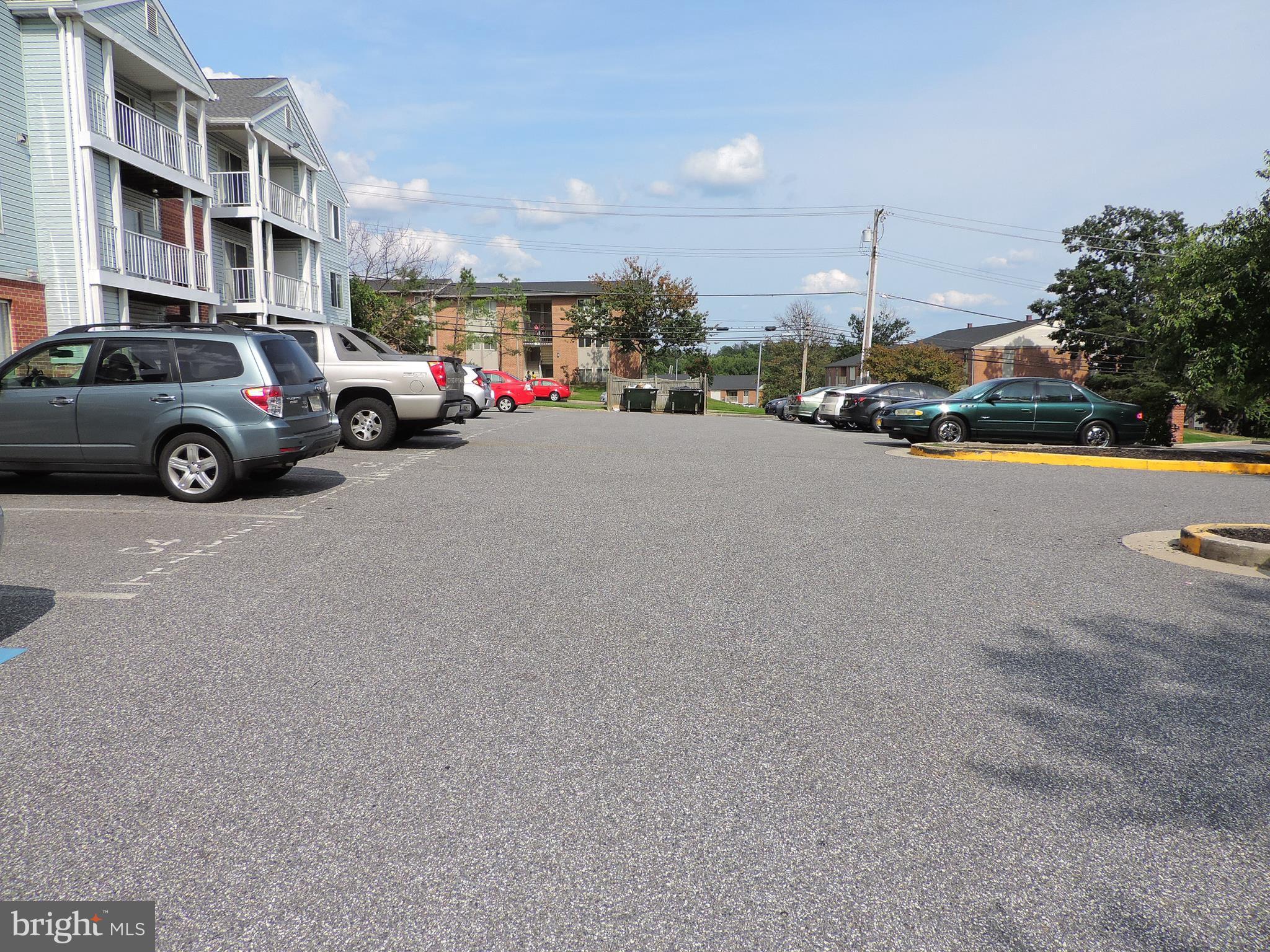 6708 Ridge Road, Unit 104 Baltimore, MD 21237 - Photo 2 of 11 a view of a city street with a large building