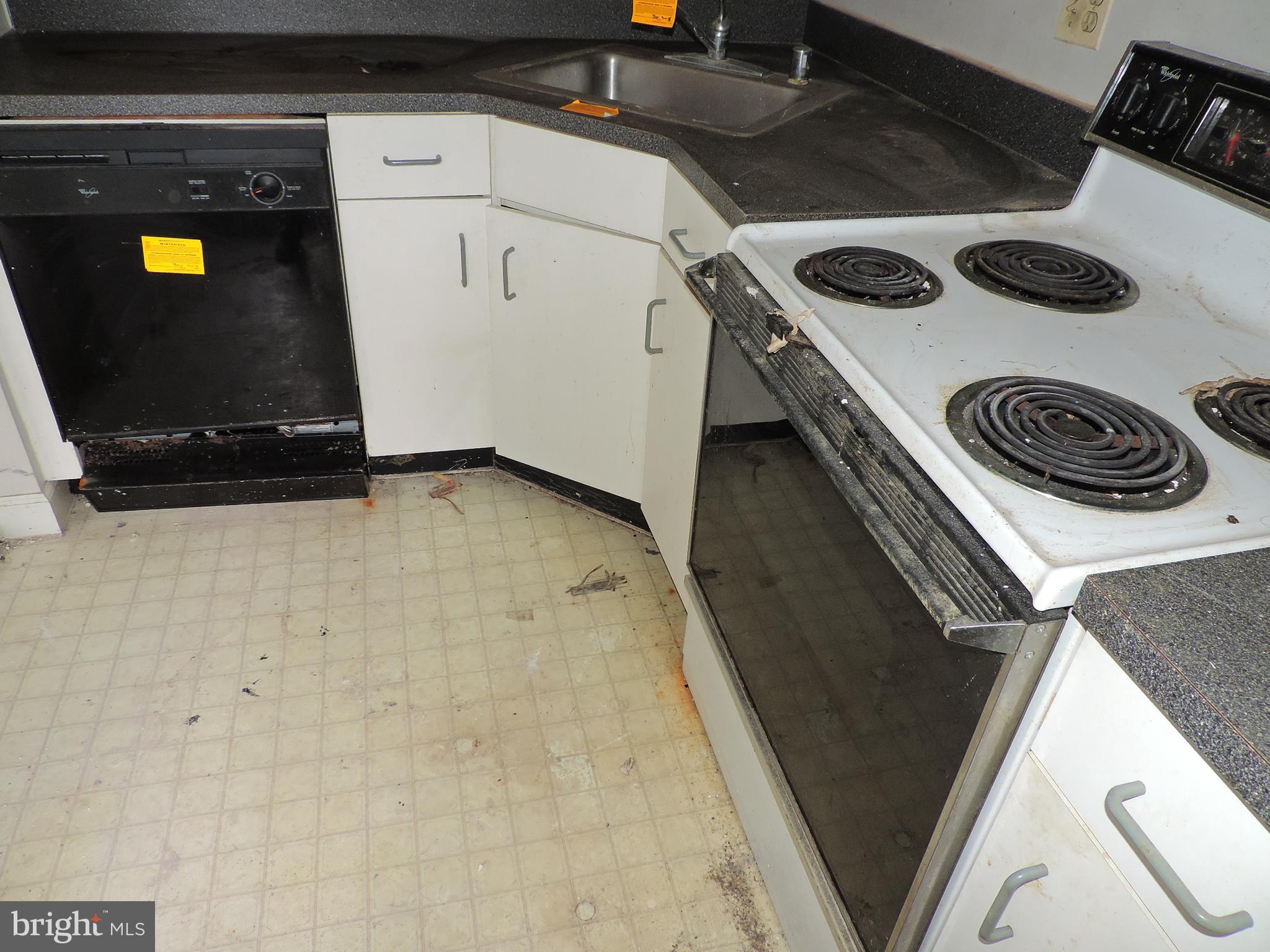 6708 Ridge Road, Unit 104 Baltimore, MD 21237 - Photo 6 of 11 a utility room with dryer and washer