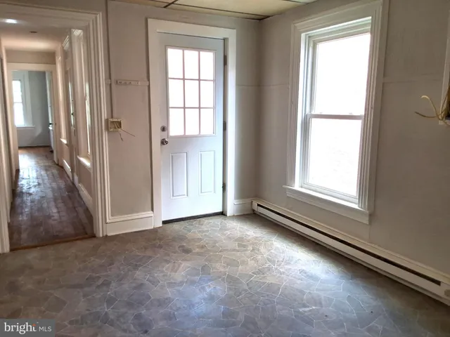 an empty room with windows