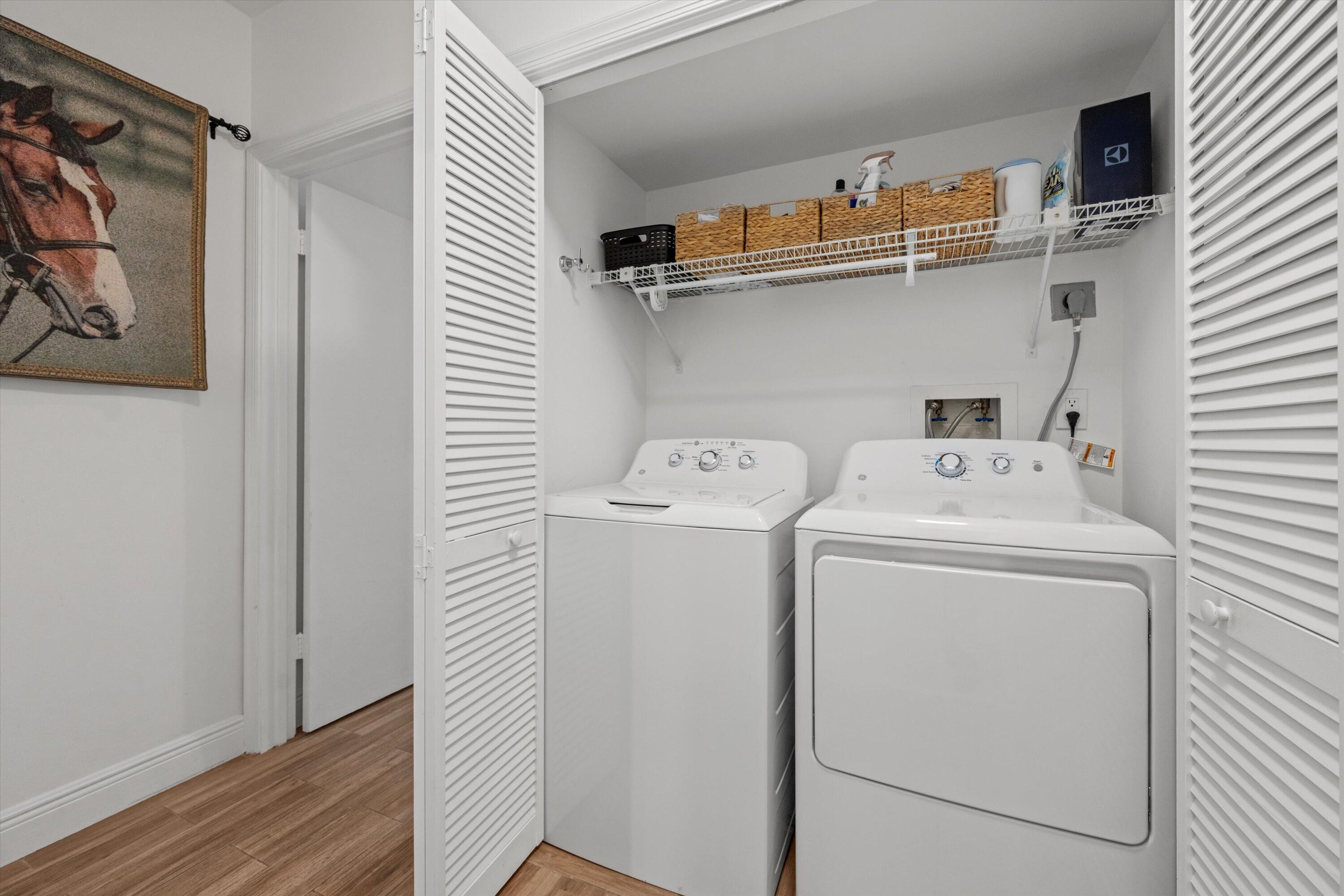 13400 Polo Road West, Unit 203 Wellington, FL 33414 - Photo 22 of 26 a utility room with dryer and washer