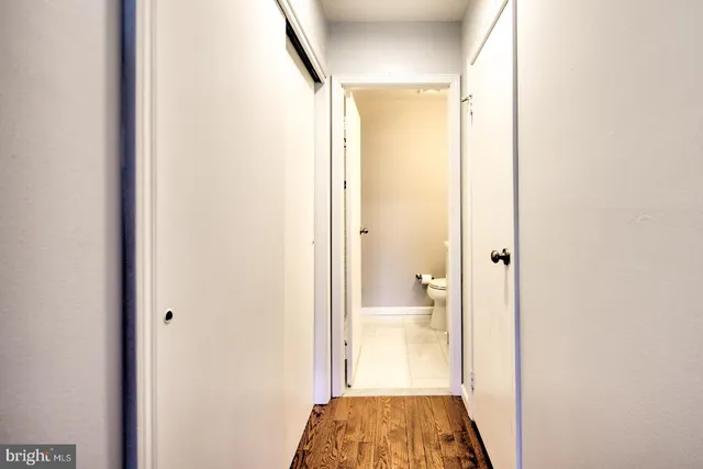 a view of bathroom with a sink and a mirror