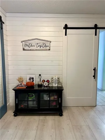 a view of entryway with a bed