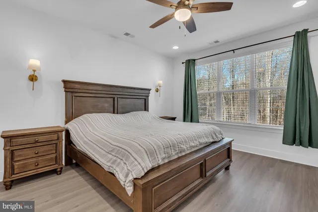 an empty room with wooden floor