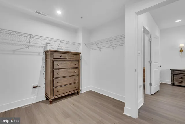 a utility room with cabinets