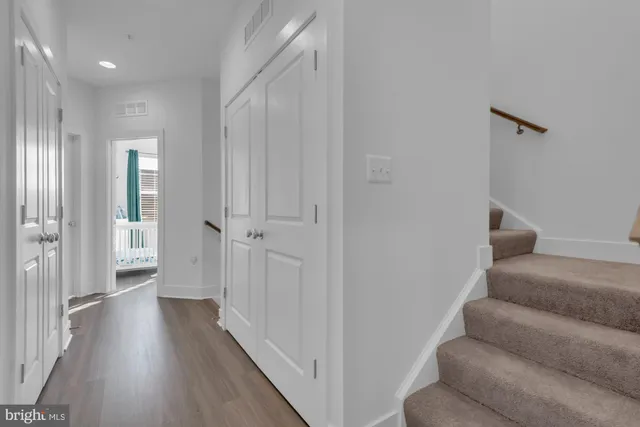 a bedroom with a bed and couch