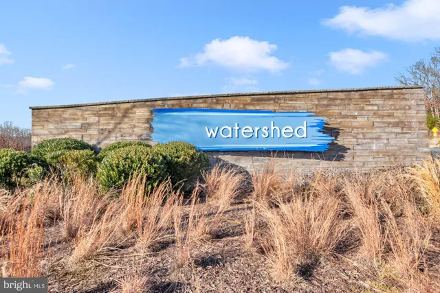 a view of a swimming pool with a terrace