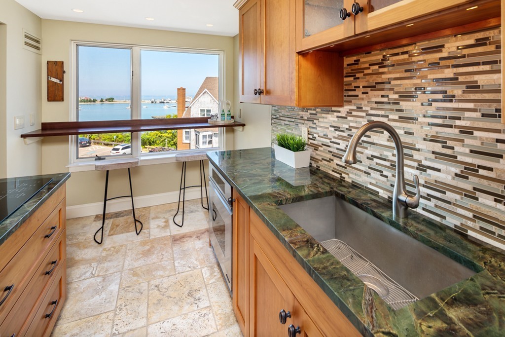 1 Commodore Court, Unit 405 Hull, MA 02045 - Photo 13 of 26 a picture of a living room with furniture