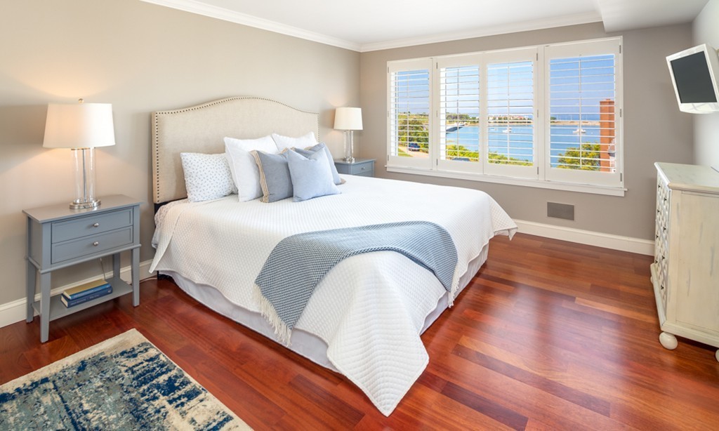 1 Commodore Court, Unit 405 Hull, MA 02045 - Photo 18 of 26 a bedroom with bed and window