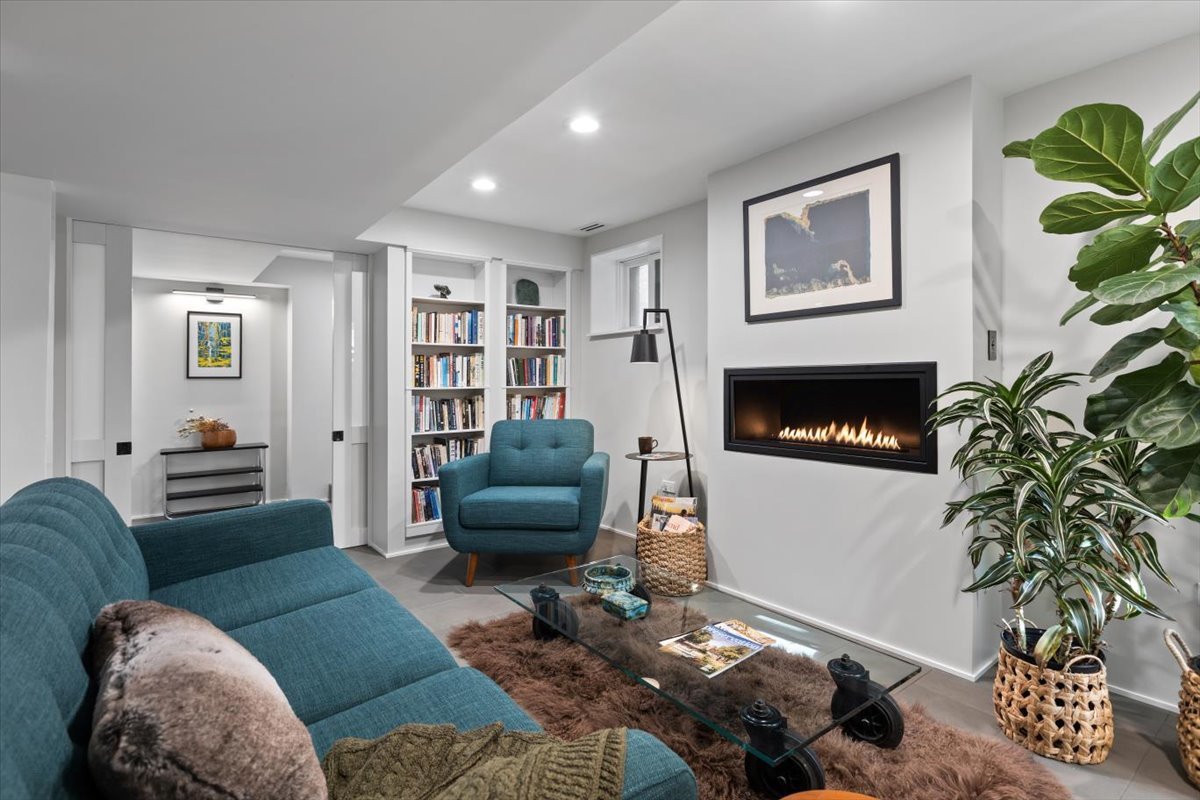 159 West Burton Place, Unit G Chicago, IL 60610 - Photo 11 of 37 a living room with furniture and a fireplace