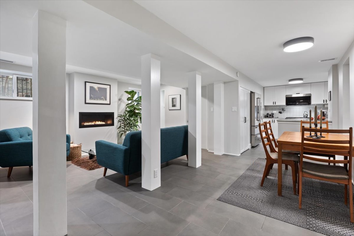 159 West Burton Place, Unit G Chicago, IL 60610 - Photo 13 of 37 a dining room with furniture and window