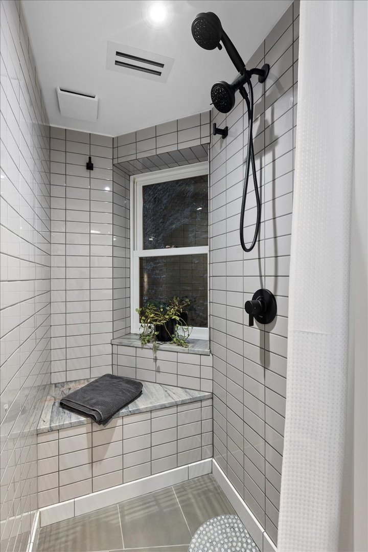 159 West Burton Place, Unit G Chicago, IL 60610 - Photo 28 of 37 a bathroom with a shower