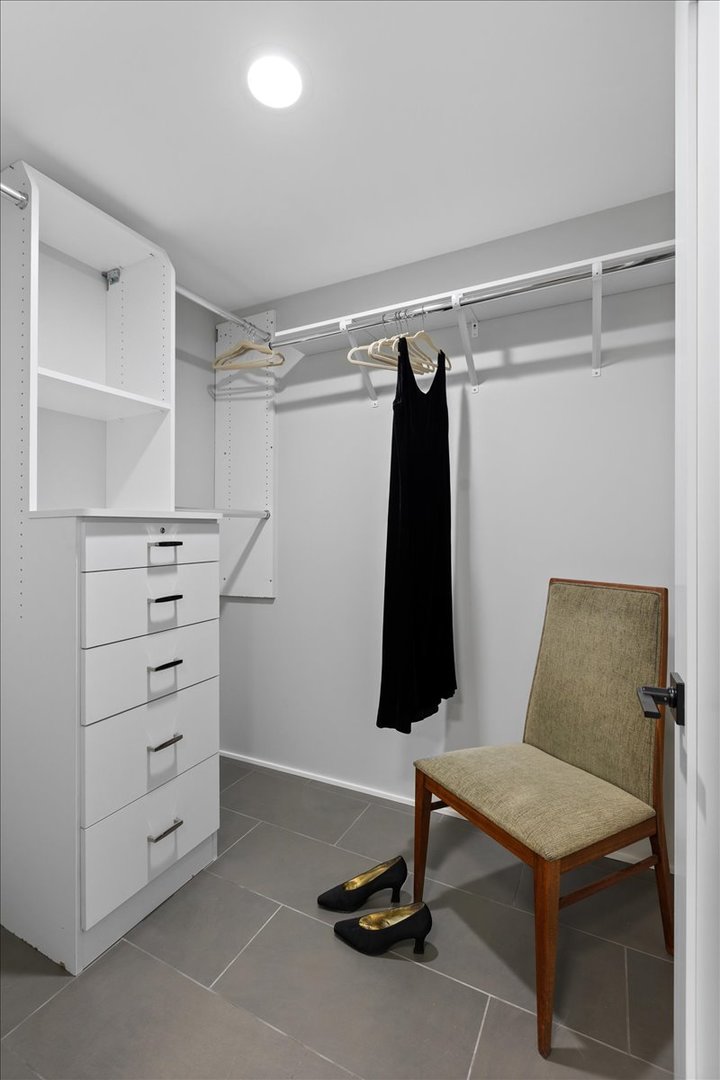 159 West Burton Place, Unit G Chicago, IL 60610 - Photo 34 of 37 a view of a room with furniture and a window