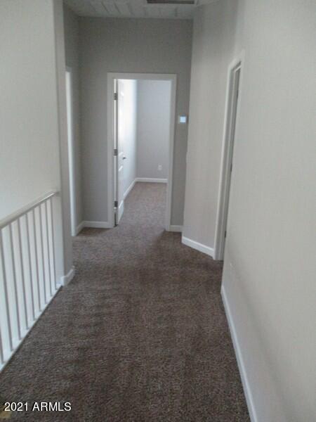 1367 South Country Club Drive, Unit 1153 Mesa, AZ 85210 - Photo 21 of 48 a view of a hallway