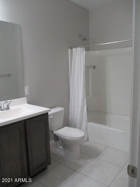 1367 South Country Club Drive, Unit 1153 Mesa, AZ 85210 - Photo 23 of 48 a bathroom with a sink a toilet and shower