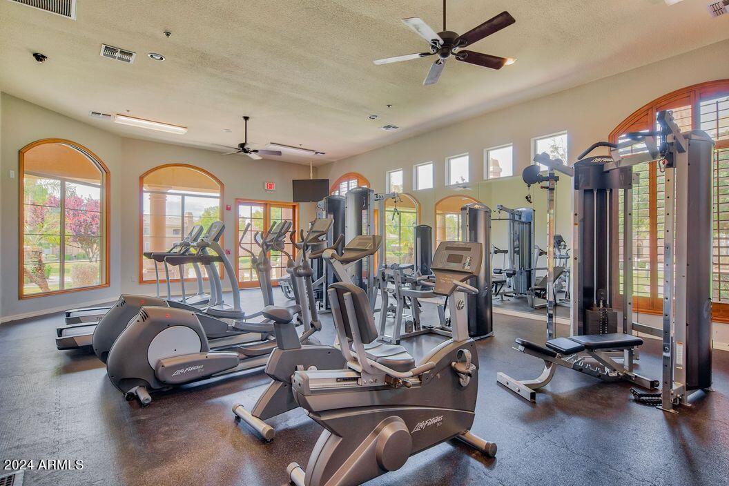 1367 South Country Club Drive, Unit 1153 Mesa, AZ 85210 - Photo 28 of 48 a view of a room with gym equipment
