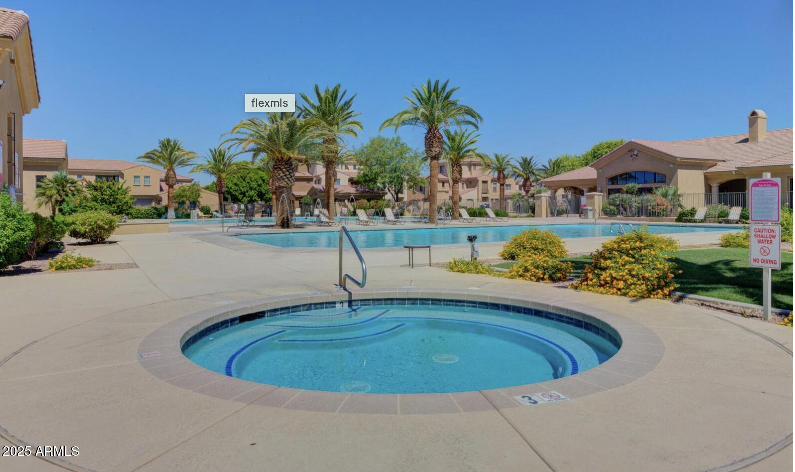 1367 South Country Club Drive, Unit 1153 Mesa, AZ 85210 - Photo 33 of 48 a view of a swimming pool with a patio