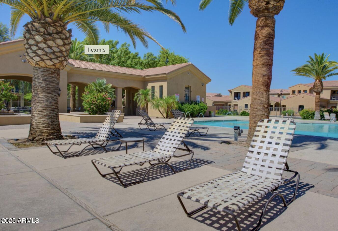 1367 South Country Club Drive, Unit 1153 Mesa, AZ 85210 - Photo 34 of 48 a view of a backyard with plants and patio